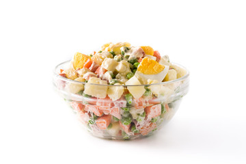 Traditional Russian salad for Christmas. Olivier salad isolated on white background.