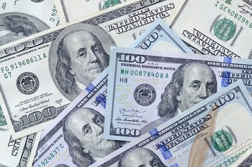 Many hundred dollar bills