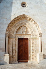 Fototapeta na wymiar Cathedral portal Santa Maria Assunta Conversano, Puglia Italy