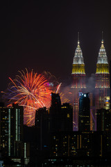 Fototapeta premium The Kuala Lumpur skyline glittered with a kaleidoscope of colours and spectacular lights and sound to mark the nation’s 62 years of independence of Malaysia.