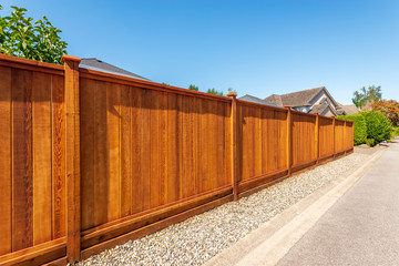 Fence built from wood. Outdoor landscape. Security and privacy concept. Vancouver. Canada. - Powered by Adobe