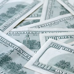 Many hundred dollar bills