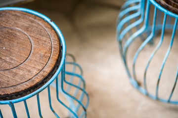  Round chair made of steel and wood.