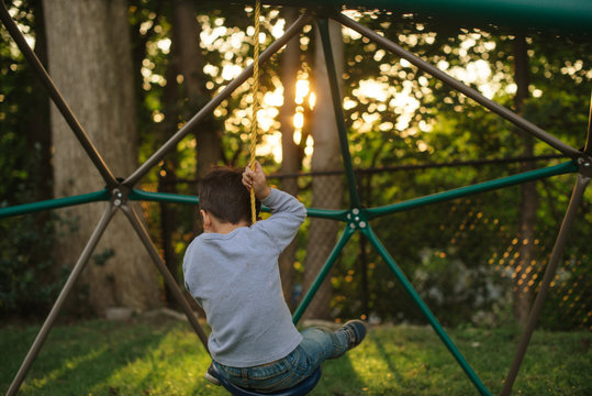 Little kid on swing