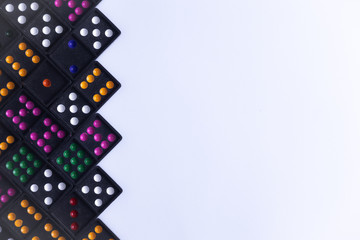 Black dominoes, pieces isolated on white background, Domino game on white background . Top view . copy space for text .