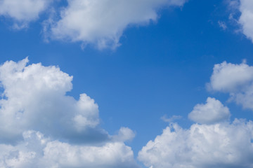 blue sky with white clouds, center place for text
