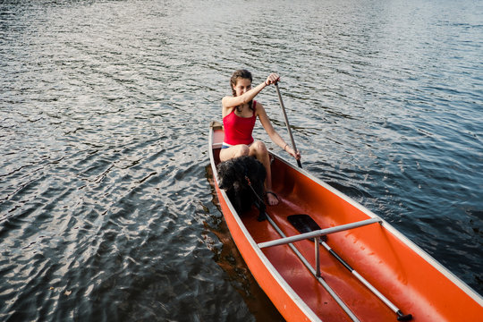 teen girl and her dog in Canoe