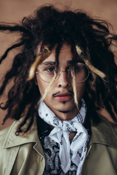 Young rasta man shot in natural light studio