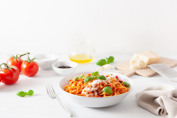tagliatelle pasta with tomato sauce parmesan basil