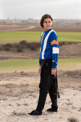 Naklejka premium YOUNG MAN WITH STRIPED JERSEY