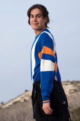 YOUNG MAN WITH STRIPED JERSEY