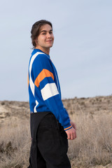 Fototapeta premium YOUNG MAN WITH STRIPED JERSEY