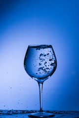 glass, drink, wine, alcohol, water, blue, wineglass, isolated, empty, liquid, beverage, clean, white, transparent, clear, crystal, bar, goblet, cold, celebration, drop, reflection, single, bocal, blac