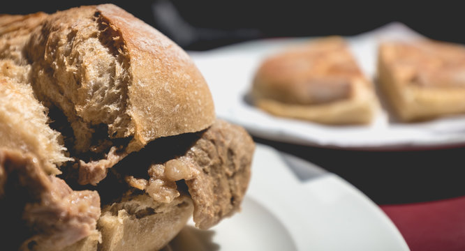 view of traditional portuguese pork beef sandwich bifana