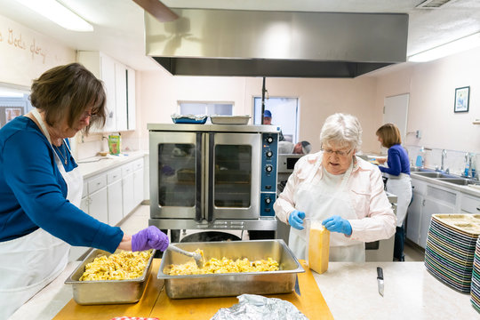 Volunteers Preparing a Community Meal