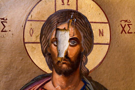 Devastated fresco of Jesus Christ in church in Syria