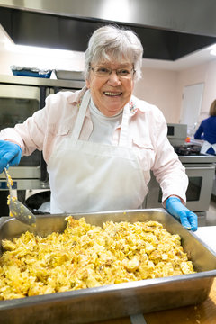 Volunteers Preparing a Community Meal