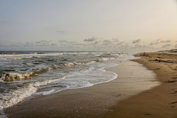 the waving northsea at the beach of texel holland