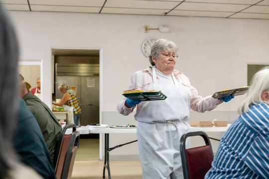 Volunteers Preparing a Community Meal