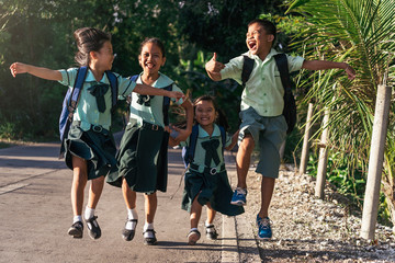 Excited kids walking after school