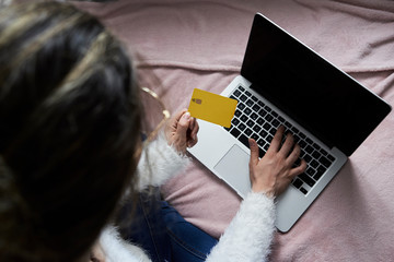 Girl purchasing products online.