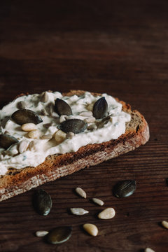 creamy cheese slice, pumpkin seed and pine nut