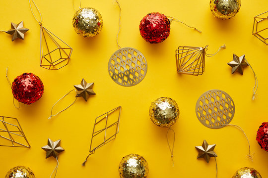 Background of colorful Christmas decor on yellow backdrop