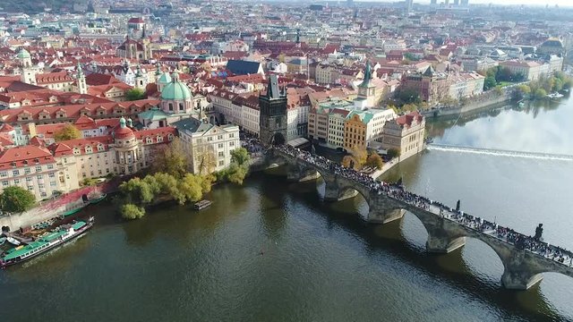 Panoramic view from above on the Prague Castle, aerial of the city, view from above on the cityscape of Prague, flight over the city, Vltava River, Charles Bridge, Prague