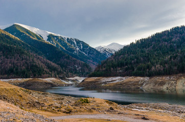 Mountain landscape and Gura Apelor lake in Retezat National Park, Carpathian Mountains, Romania
