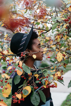 A beautiful young african american woman outside on an autumn day