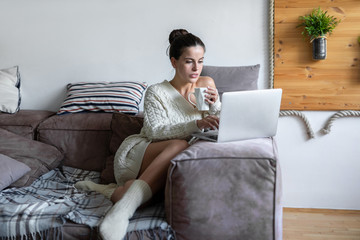 Young woman using laptop