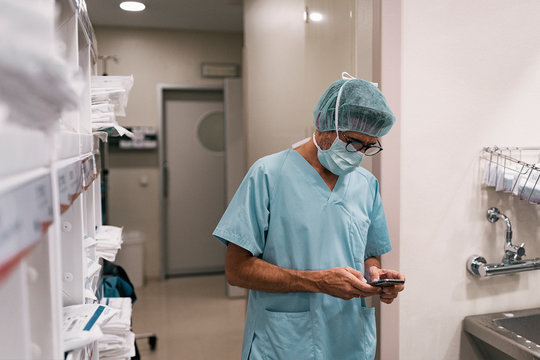Doctor using mobile in hospital