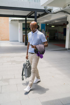 Young causal businessman going to work