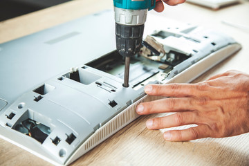 man repair computer