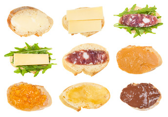 various open sandwiches on fresh bread isolated