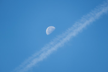 The Moon and contrail