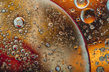  cosmically beautiful oil circles in which there are many bubbles. fabulously beautiful. background. bubbles in this soap world