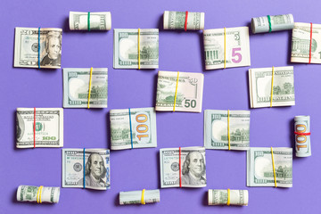 Fototapeta na wymiar colored Background with money american hundred dollar bills on top wiev with copy space for your text in business concept