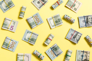colored Background with money american hundred dollar bills on top wiev with copy space for your...