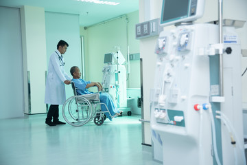 Doctors and sick people With advanced dialysis equipment in the hospital background for business...