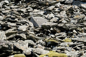 Stacked Slate Rocks Forming a Wall