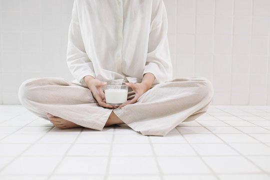 A Woman Holding Glass Of Milk