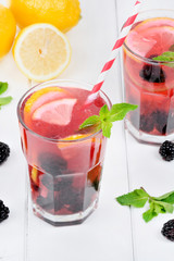 Delicious blackberries lemonade in a glasses
