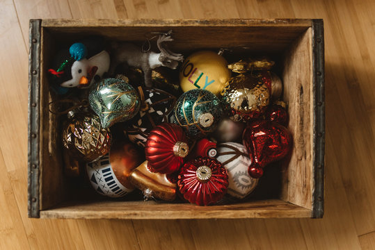 Vintage christmas ornaments in a rustic wood box