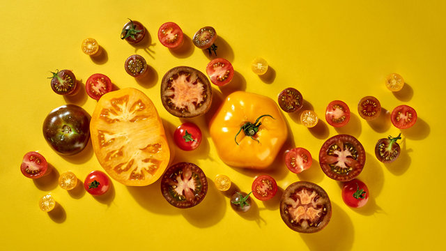 Fresh vegetable pattern with ripe tomatoes different shapes and