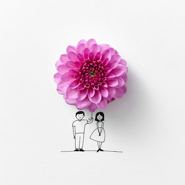 Pink flower in the form of an umbrella, drawn by a man and a wom