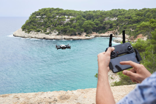 Pilot landing drone.