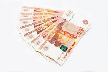 Scattered Russian 5000 rubles banknotes closeup