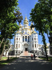 Fototapeta na wymiar Kharkiv Ukraine - Front view of Myronosyts orthodox church in the Victory Peremohy park during sunny day.
