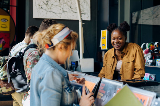 Students in record store shopping for vinyl